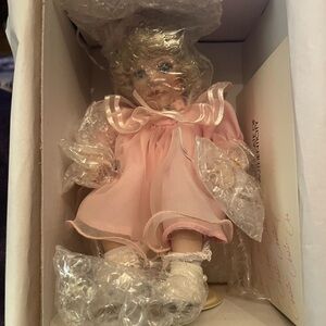 Vintage Porcelain Doll in Pink Dress